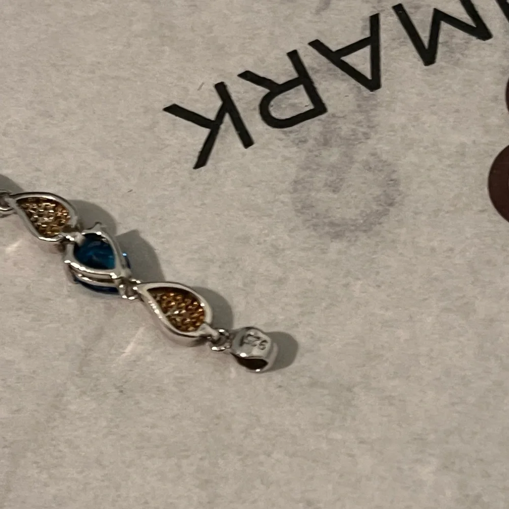 LOVED AUTHENTIC LONDON BLUE TOPAZ STONES/BLUE FIRE OPAL STERLING SILVER BRACELET